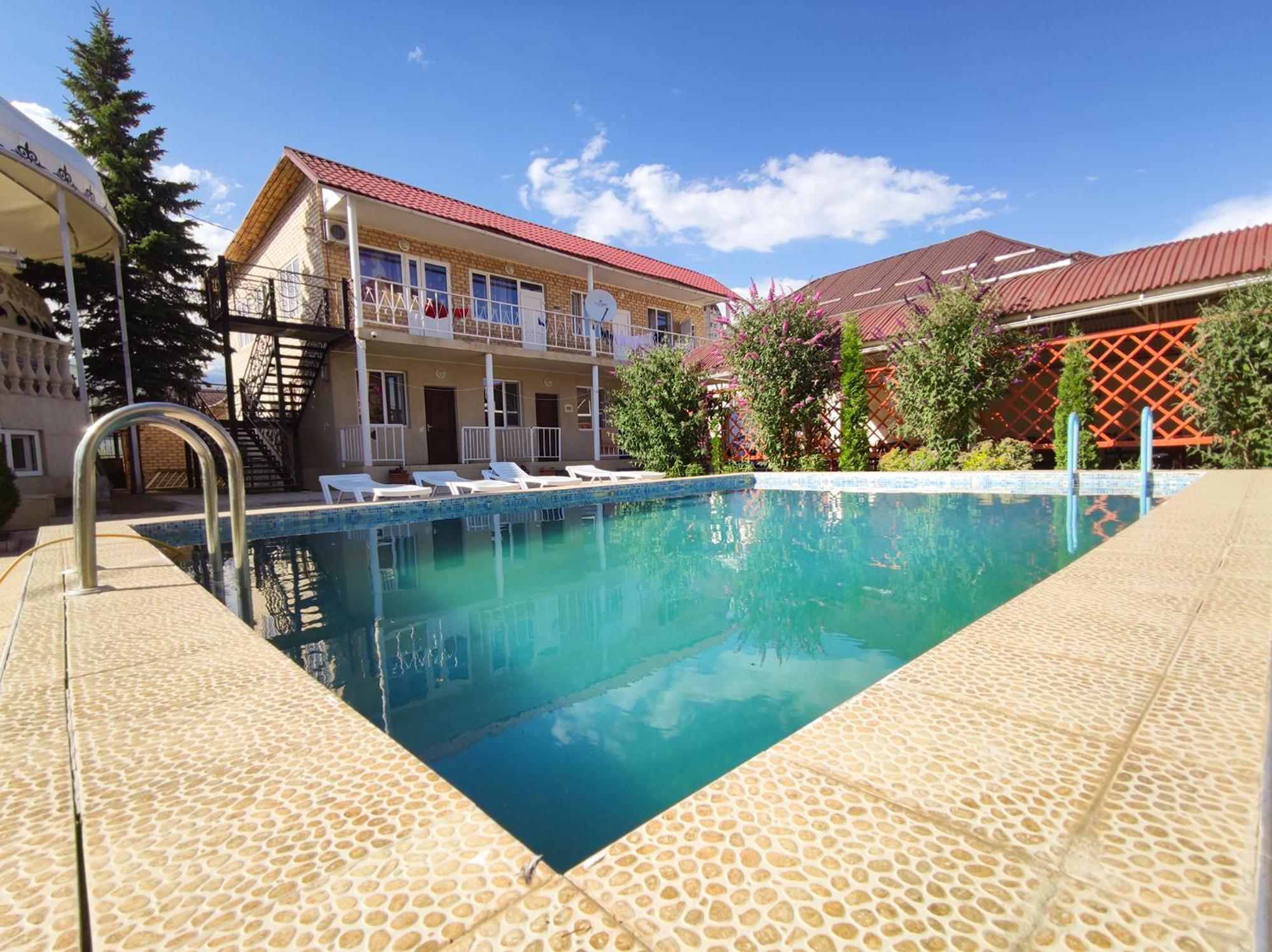 Hotel Адилет Cholpon-Ata Exterior foto